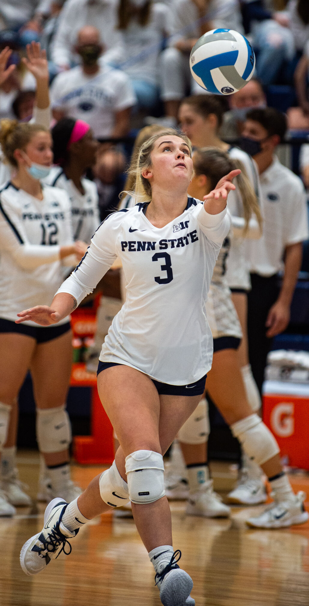 Keaton Broughton (3) serves volleyball against Nebraska